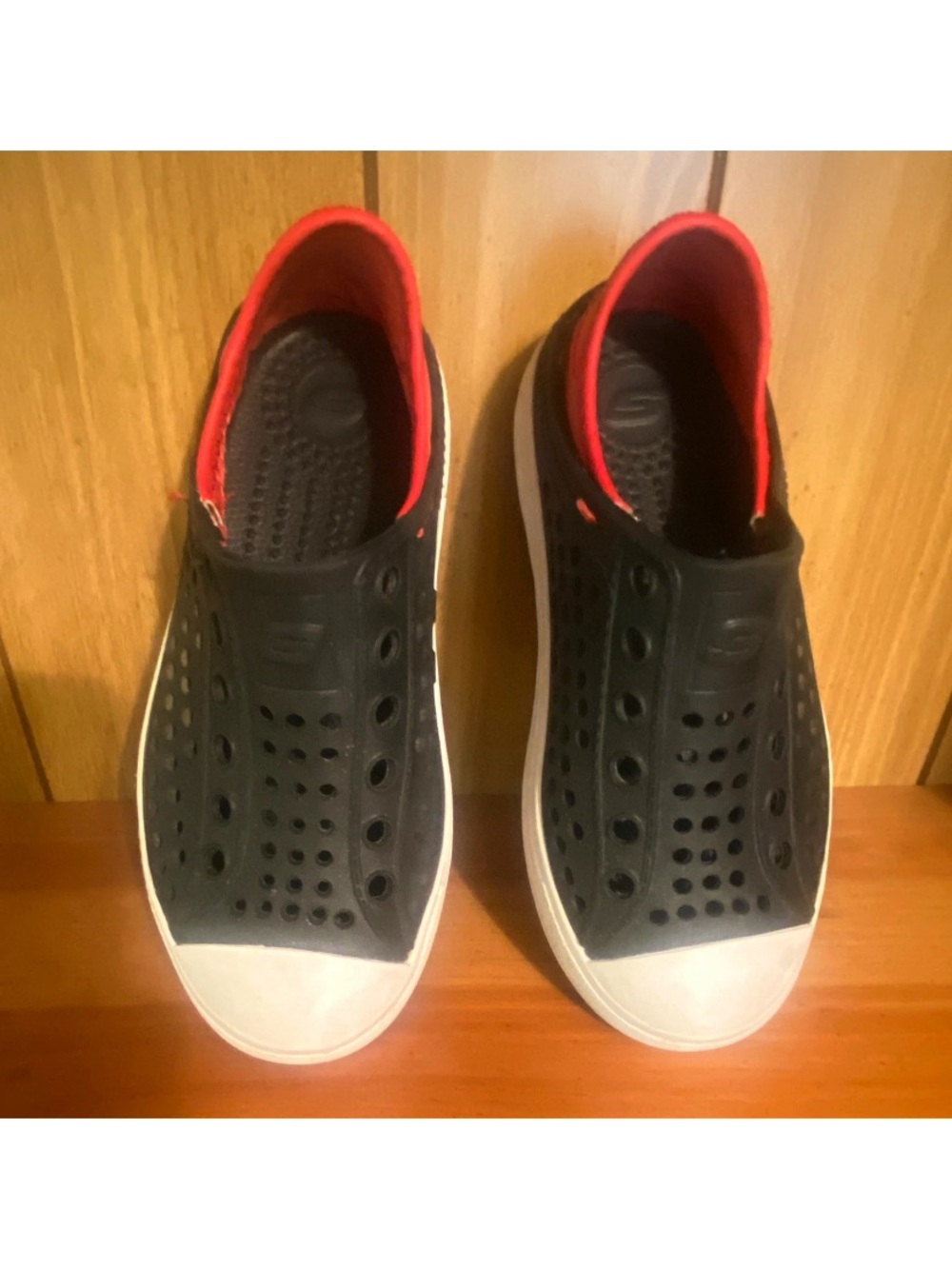 Skechers Kids Black Slip-On Perforated Sneakers with Red Lining